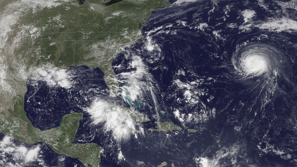 PHOTO: Three storm systems are shown, from left to right,Tropical Depression Nine, Tropical Depression Eight, and Hurricane Gaston in the central Atlantic Ocean are shown in this GOES East satellite image captured, Aug. 29, 2016.