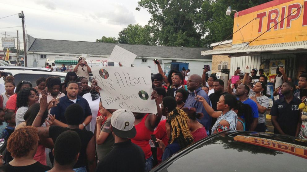 People protest after Alton Sterling, was shot in Baton Rouge, Louisiana, July 5, 2016.