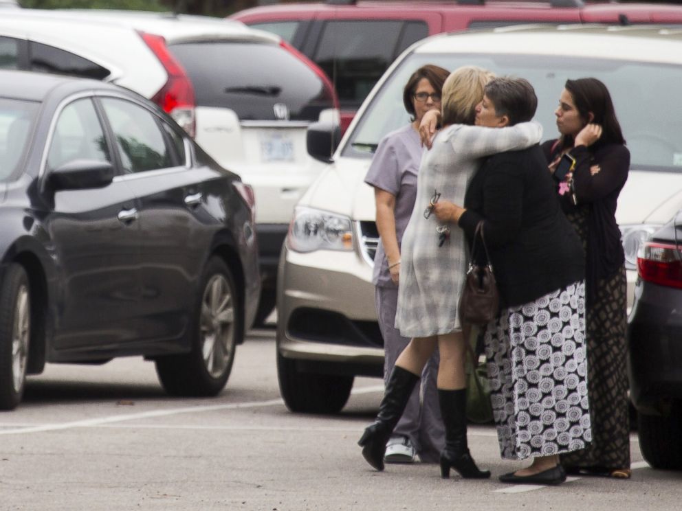 PHOTO: Mourners embrace before funeral services for six-year-old Jeremy Mardis at Moore Funeral Chapel in Hattiesburg, Mississippi, Nov. 9, 2015.