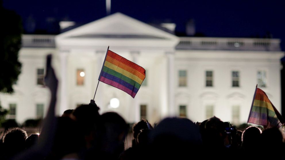 PHOTO: A rainbow flag is held up during a vigil after the worst mass shooting in U.S. history at a gay nightclub in Orlando, in front of the White House in Washington, June 12, 2016.