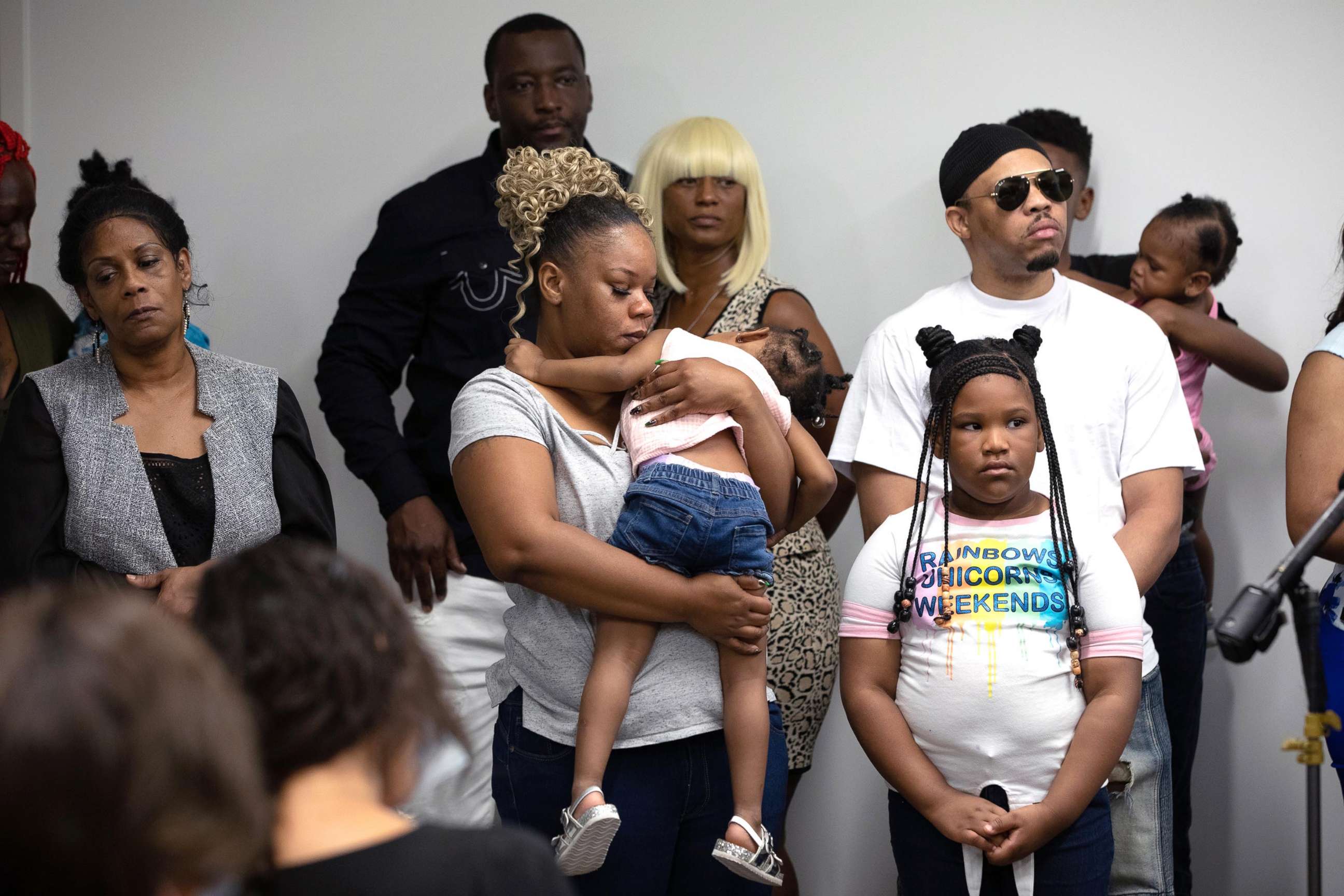 PHOTO: Rayshard Brooks widow Tomika Miller holds one of her daughters as family lawyers speaks to media , June 15, 2020, in Atlanta. 
