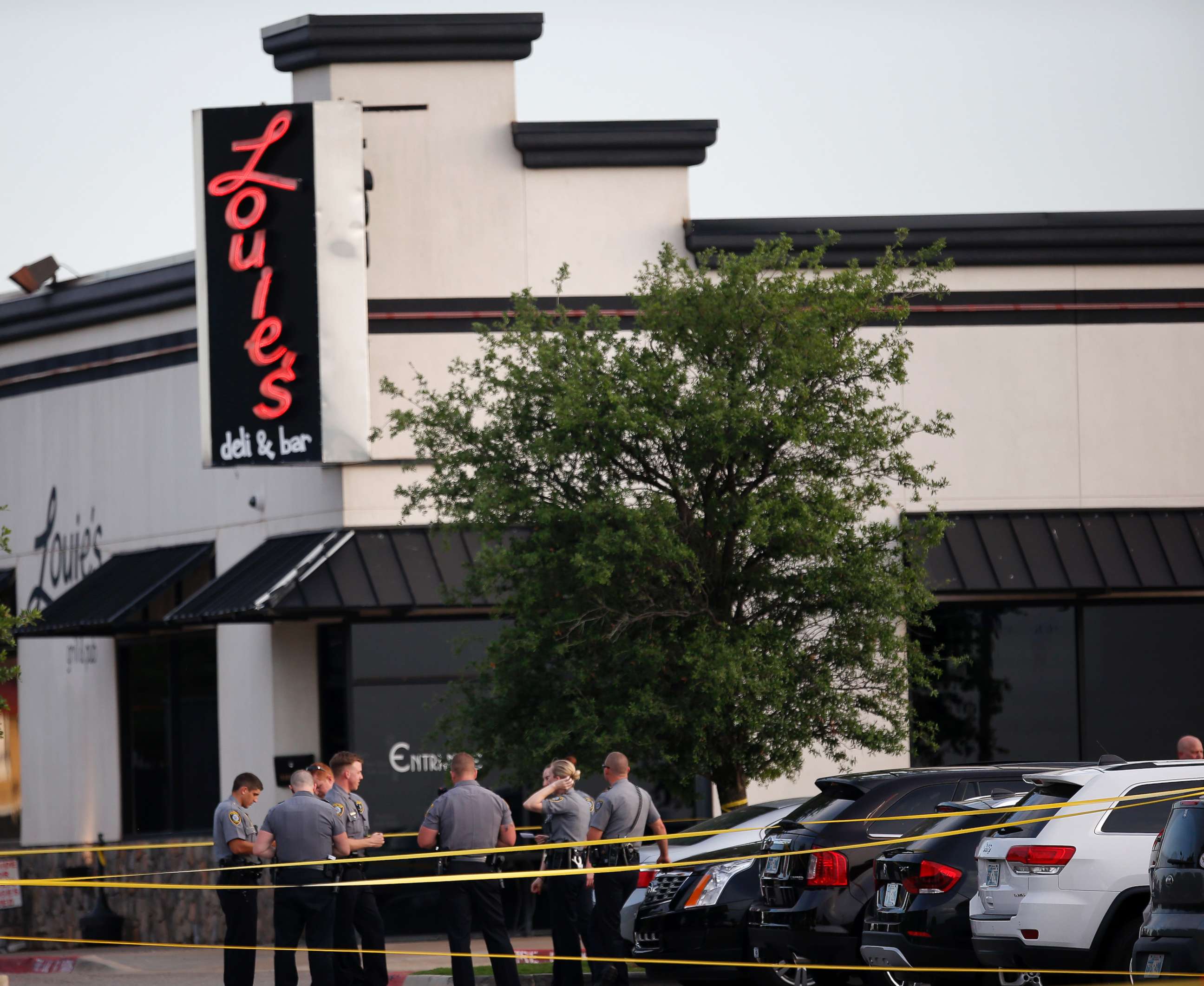 PHOTO: Police officers stand at the scene of a shooting on the east side of Lake Hefner in Oklahoma City, Thursday, May 24, 2018.