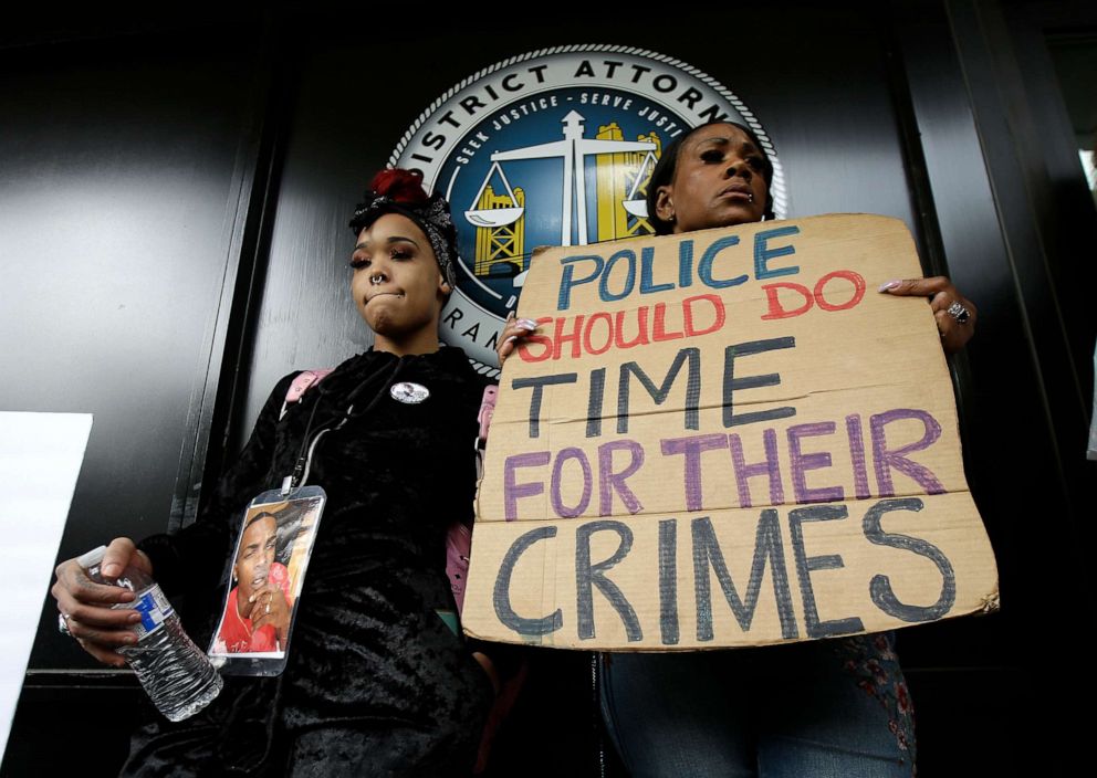 PHOTO: This April 4, 2018, file photo shows protesters standing outside the office of Sacramento County District Attorney Anne Marie Schubert calling for the indictment of two Sacramento police officers in the shooting death of Stephon Clark.