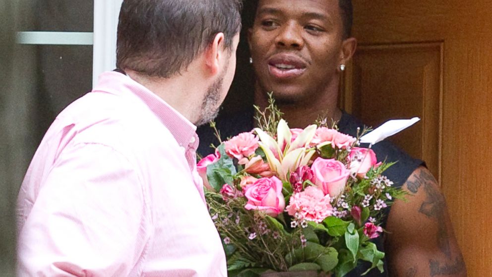Ray Rice receives flowers at his home in Baltimore, Sept. 9, 2014.