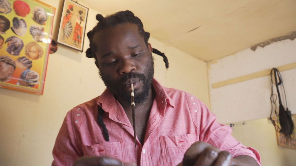 PHOTO: Salon Owner Godfrey Maale said he does not want to be vaccinated.