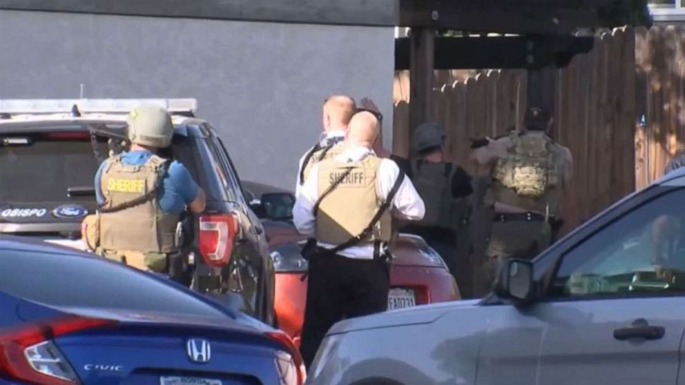 Police officer shot and killed in line of duty while serving search ...
