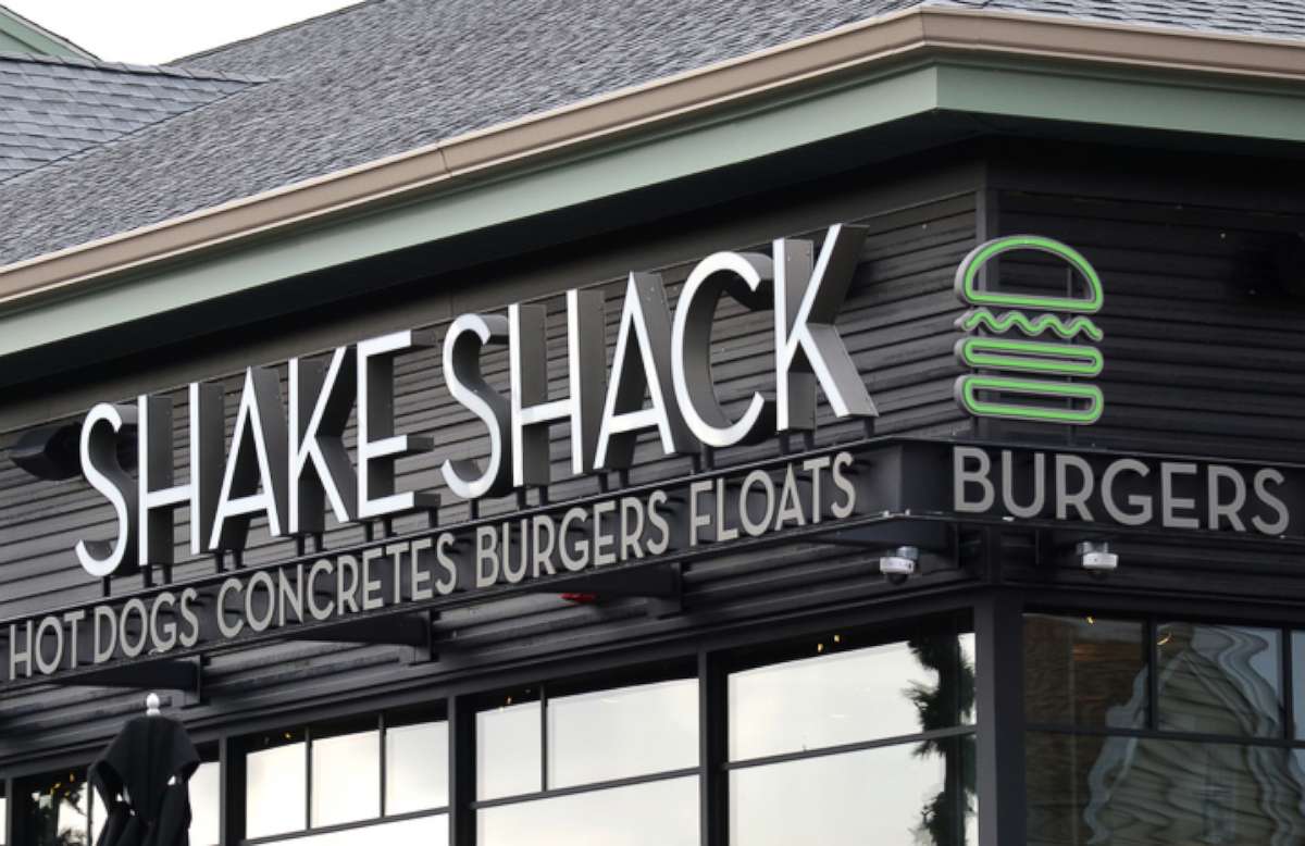 PHOTO: A Shake Sack sign hangs in front of their restaurant at the Woodbury Common Premium Outlets shopping mall on November 17, 2019 in Central Valley, New York.