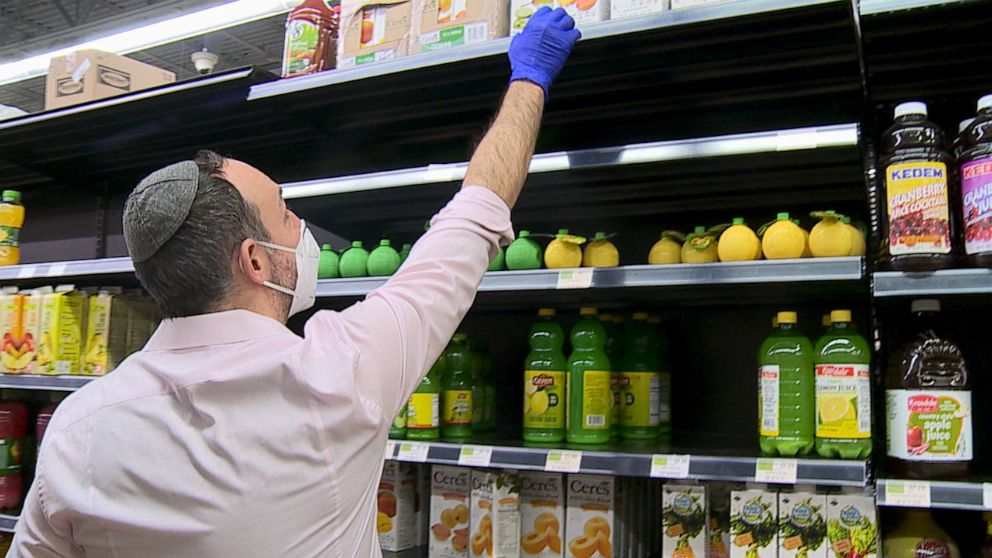 PHOTO: After a busy day working as a gastroenterologist, Josh Rosenbloom is seen shopping for the at-risk population in Baltimore's kosher supermarket, Market Maven.