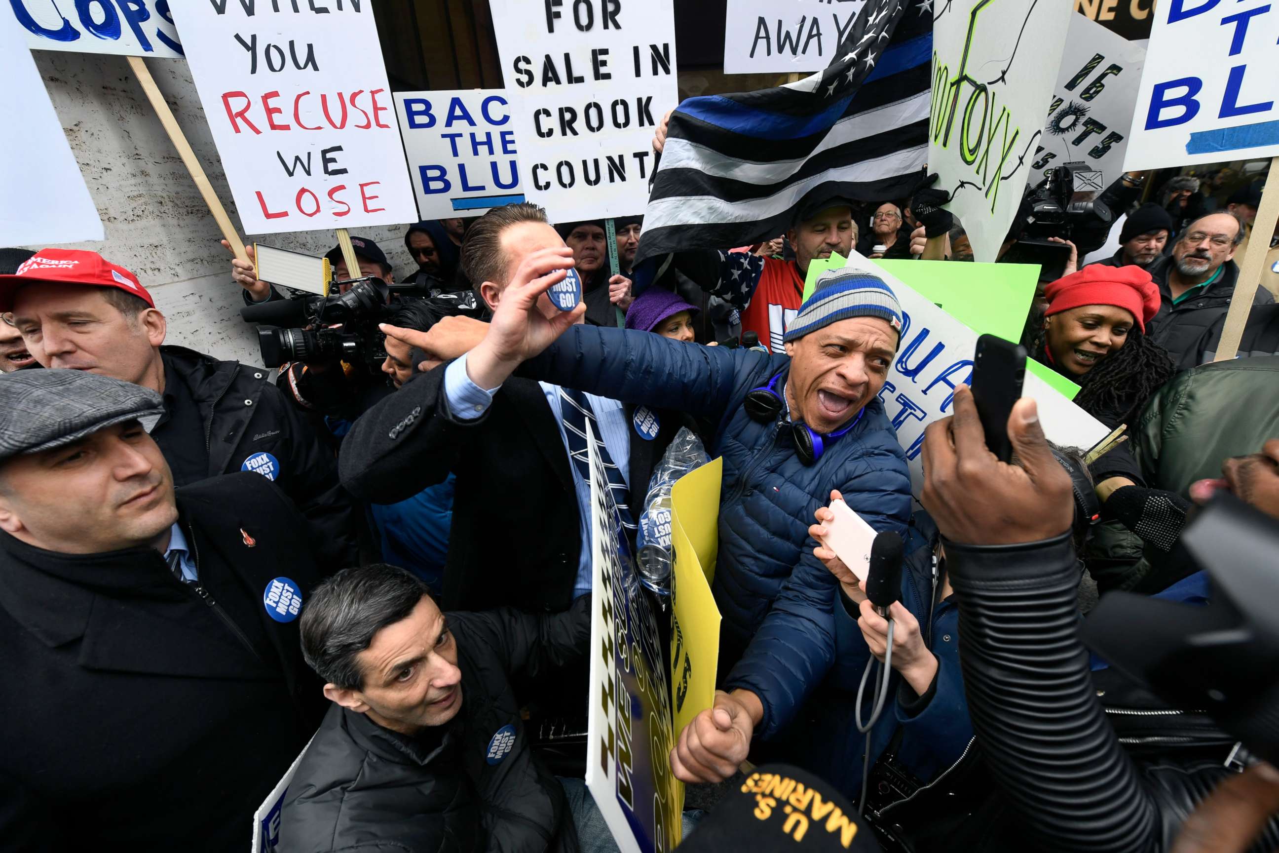 PHOTO: Dueling protestors clash over Cook County State's Attorney Kim Foxx's office's decision to drop all charges against "Empire" actor Jussie Smollett, April 1, 2019, in Chicago. 