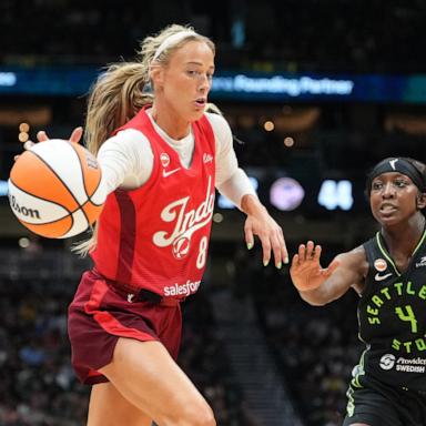 PHOTO: Sophie Cunningham of the Indiana Fever handles the ball against Flau'jae Johnson of the Seattle Storm during their WNBA game, July 28, 2026 in Seattle.