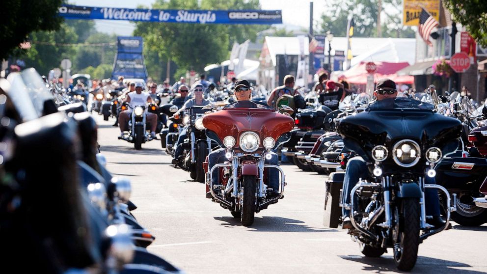 PHOTO: Bikers ride down Main Street in downtown Sturgis, S.D., before the 76th Sturgis motorcycle rally, Aug. 5, 2016.