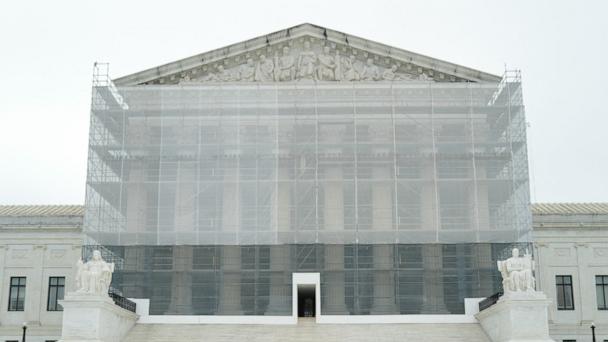 Supreme Court Police officers stand outside the Supreme Court in Washington, June 27, 2025. 