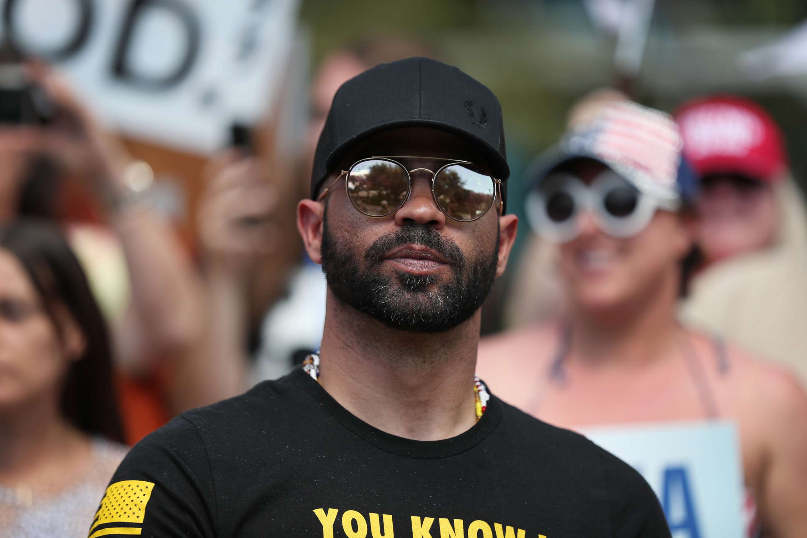 PHOTO: Enrique Tarrio, leader of the Proud Boys, stands outside of the Hyatt Regency where the Conservative Political Action Conference is being held, Feb. 27, 2021, in Orlando, Fla.