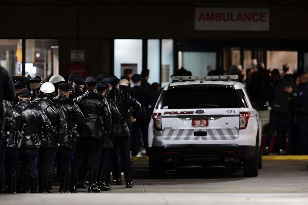 PHOTO: Police gather at Temple University Hospital following a fatal shooting of a Temple University police officer near the campus on Saturday, Feb. 18, 2023, in Philadelphia. (Elizabeth Robertson/The Philadelphia Inquirer via AP)