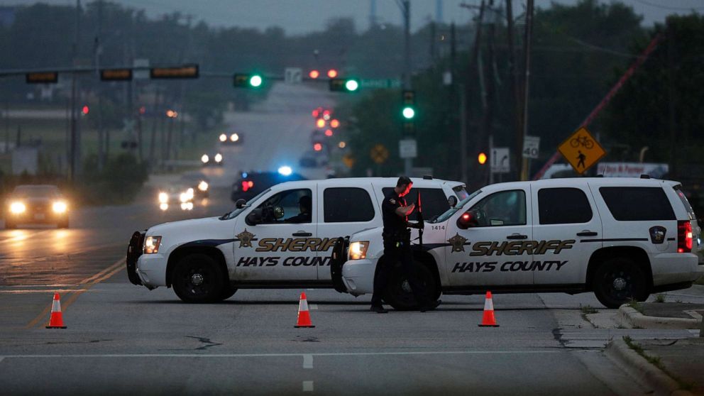 PHOTO: Police block off the scene after a police officer was fatally shot Saturday, April 18, 2020, in San Marcos, Texas. 