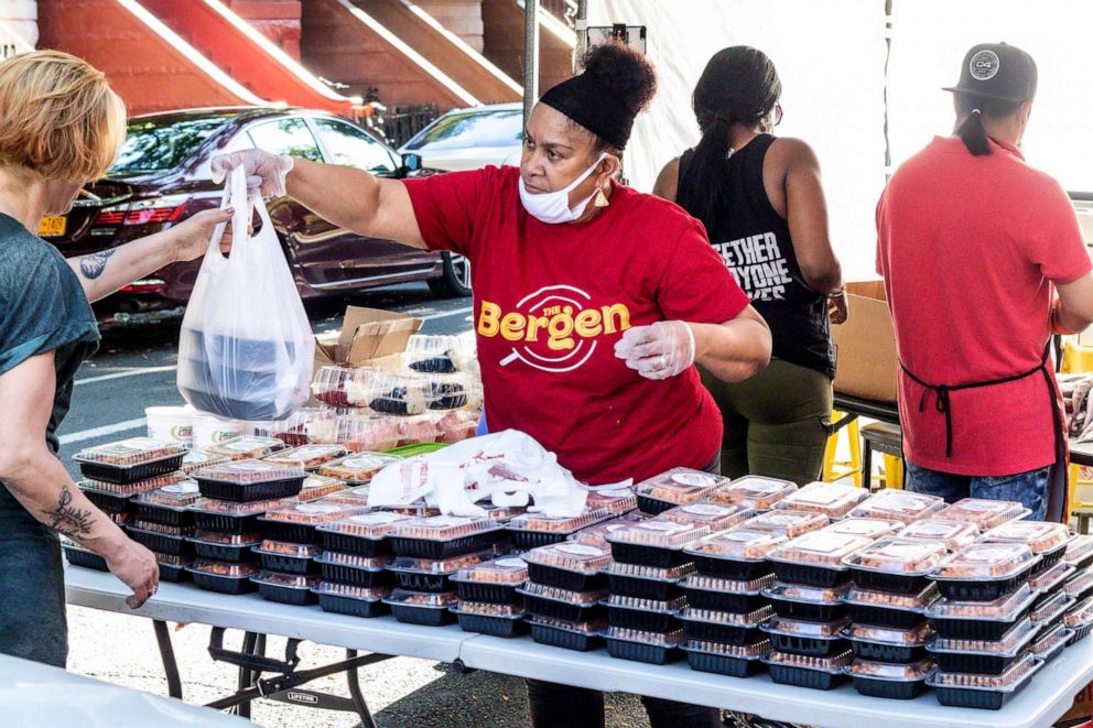 PHOTO: Staff serves customers outside of the The Bergen restaurant in Brooklyn.