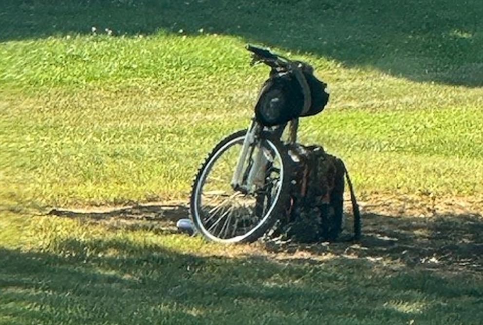 PHOTO: Police photographed a bicycle and backpack at 5:28pm.