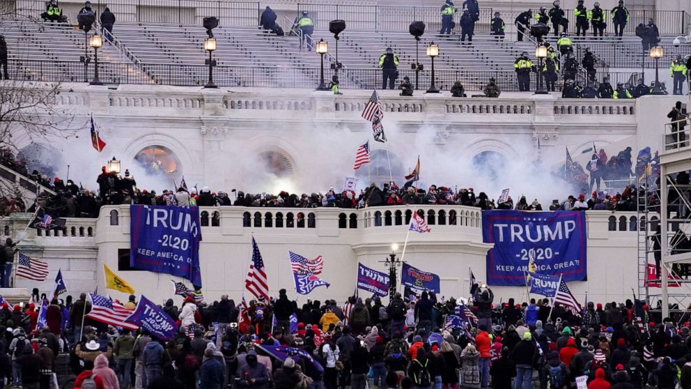 PHOTO: FILE - Violent insurrectionists storm the Capitol, Jan. 6, 2021, in Washington. A federal jury is set to resume deliberating in the trial of a former Virginia police officer charged with storming the U.S. Capitol with another off-duty officer. 