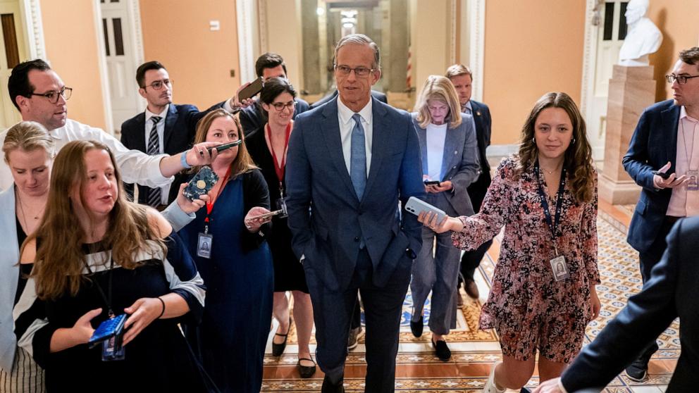 PHOTO: Majority Leader John Thune Sen. Lisa Murkowski walk to the Senate floor on Capitol Hill in Washington, D.C., on July 1, 2025.