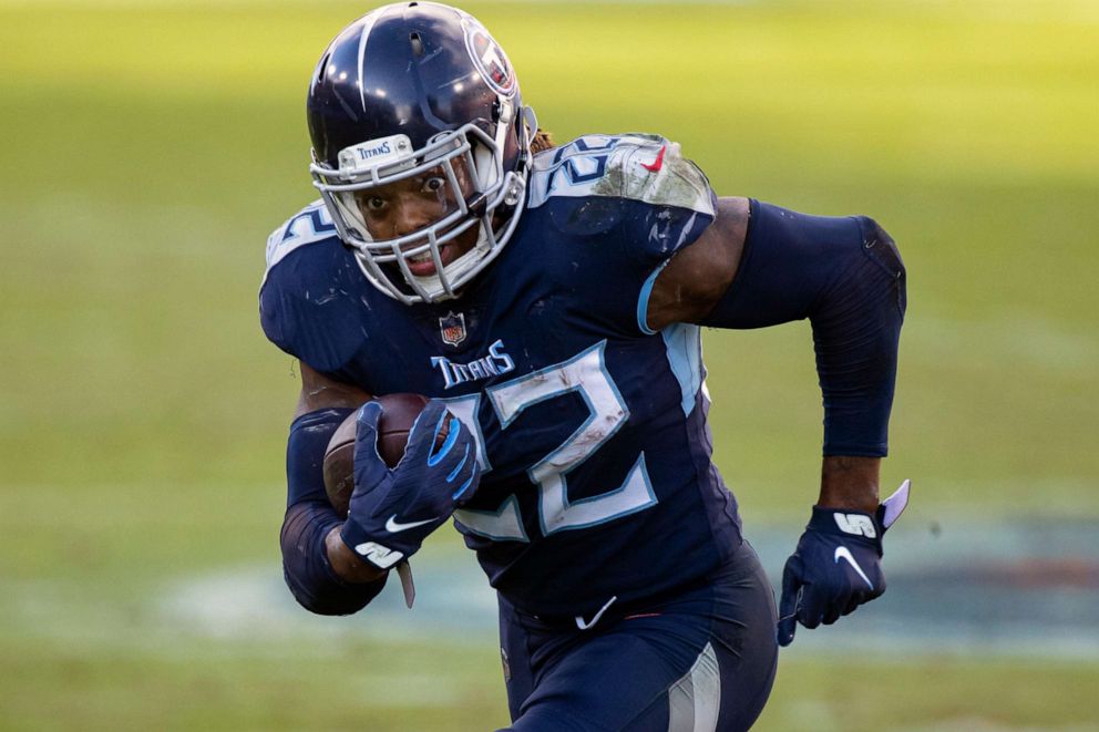 PHOTO: FILE - Tennessee Titans running back Derrick Henry runs with the ball against the Detroit Lions during the fourth quarter of an NFL football game in Nashville, Tenn., in this Sunday, Dec. 20, 2020, file photo.