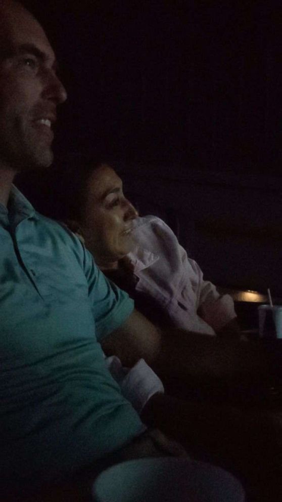 PHOTO: Drew and Kayla Gottfried watching their wedding video on July 27, 2021.