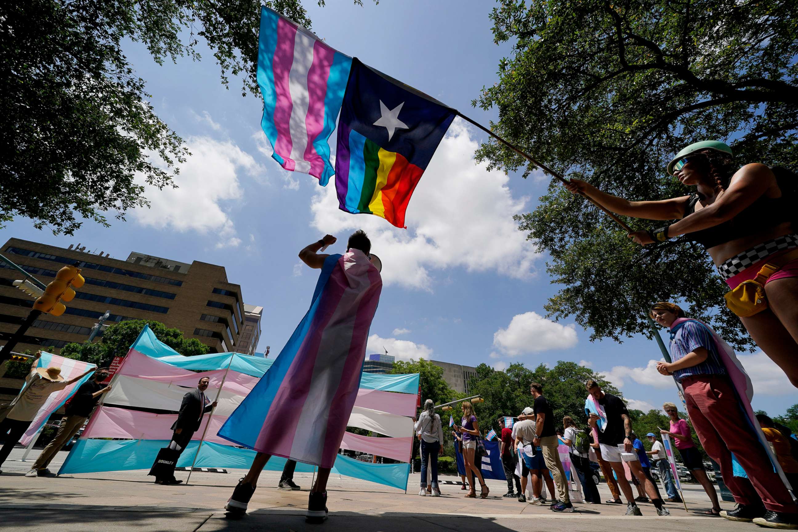 PHOTO: Demonstrators gather on the steps to the State Capitol to speak against transgender-related legislation bills being considered in the Texas Senate and Texas House, May 20, 2021 in Austin, Texas.