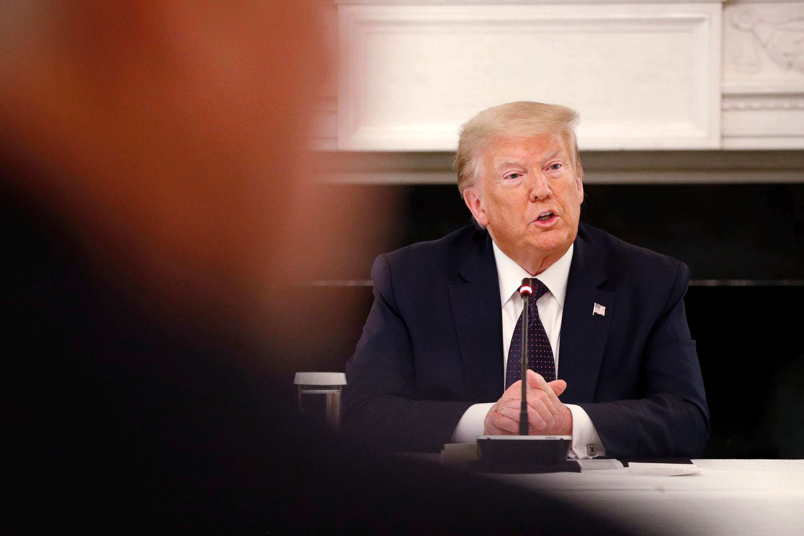 PHOTO: President Donald Trump speaks during a roundtable discussion with law enforcement officials, June 8, 2020, in the State Dining Room of the White House.