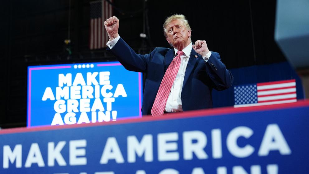 PHOTO: President Donald Trump dances at a campaign rally at Heartland Credit Union Arena, on Oct. 19, 2026, in Park City, Kansas.