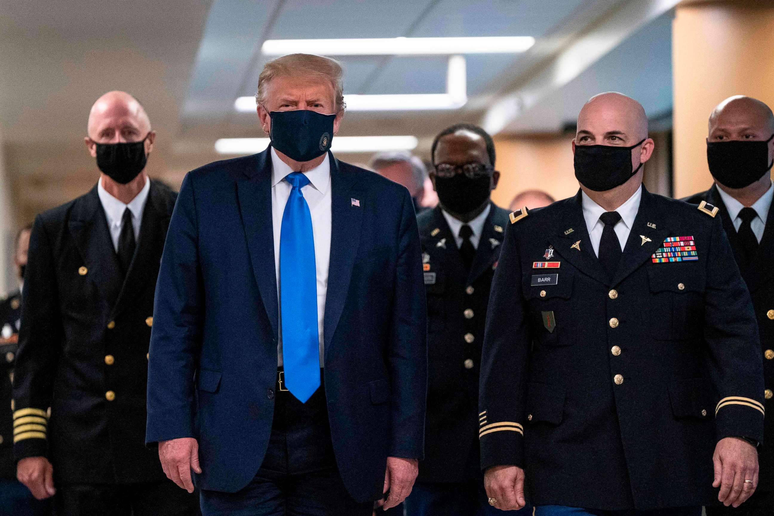 PHOTO: President Donald Trump wears a mask as he visits Walter Reed National Military Medical Center in Bethesda, MD., on July 11, 2020.