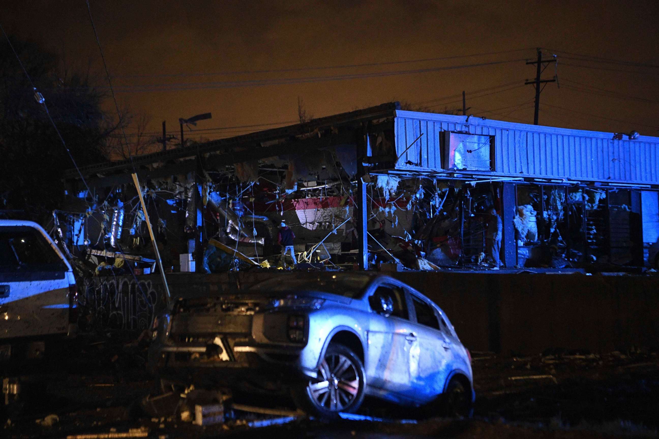 PHOTO: Damamged vehicles and buildings are seen in East Nashville after a tornado hit the city in the early morning hours of Tuesday, March 3, 2020. 