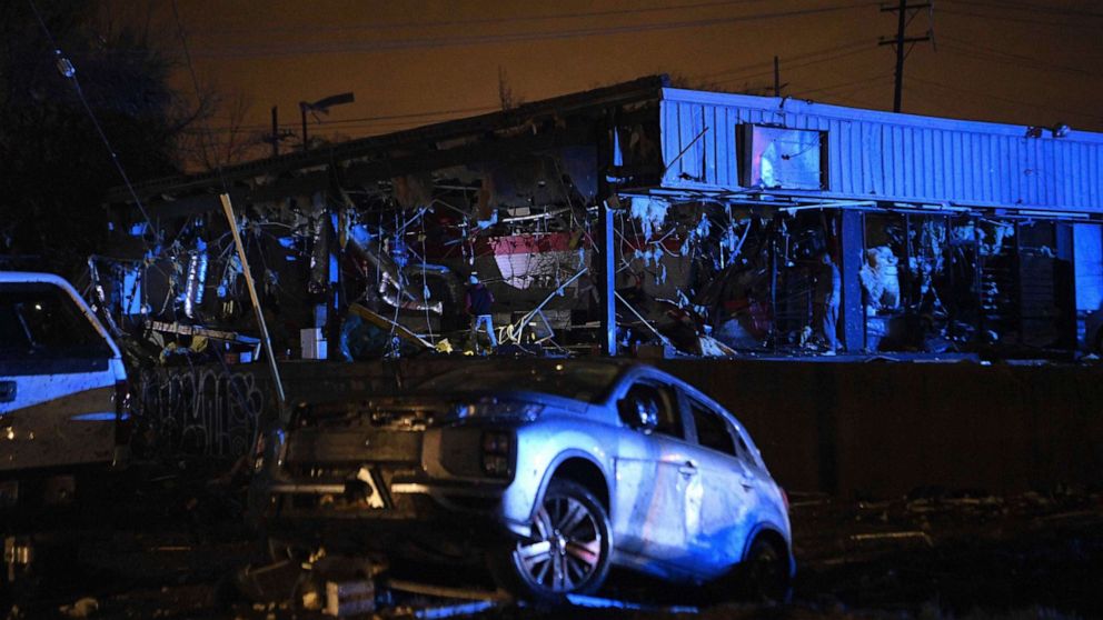 PHOTO: Damamged vehicles and buildings are seen in East Nashville after a tornado hit the city in the early morning hours of Tuesday, March 3, 2020. 