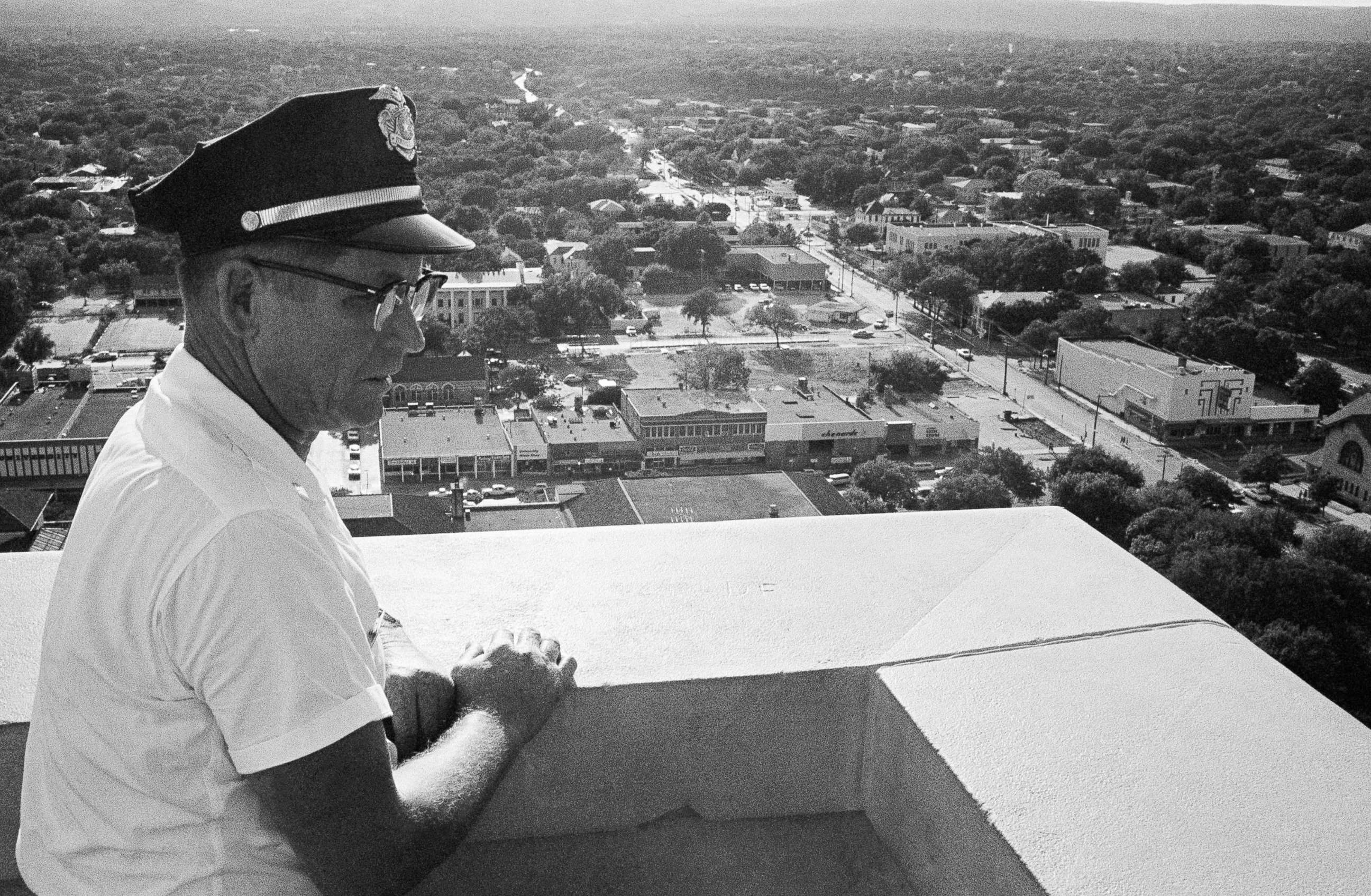 PHOTO: Sgt. Robert W. Turner, 50, of the University of Texas police, looks at the spot on the observation tower of the administration building where Charles J. Whitman was gunned down by police in Austin, Aug. 1, 1966.  