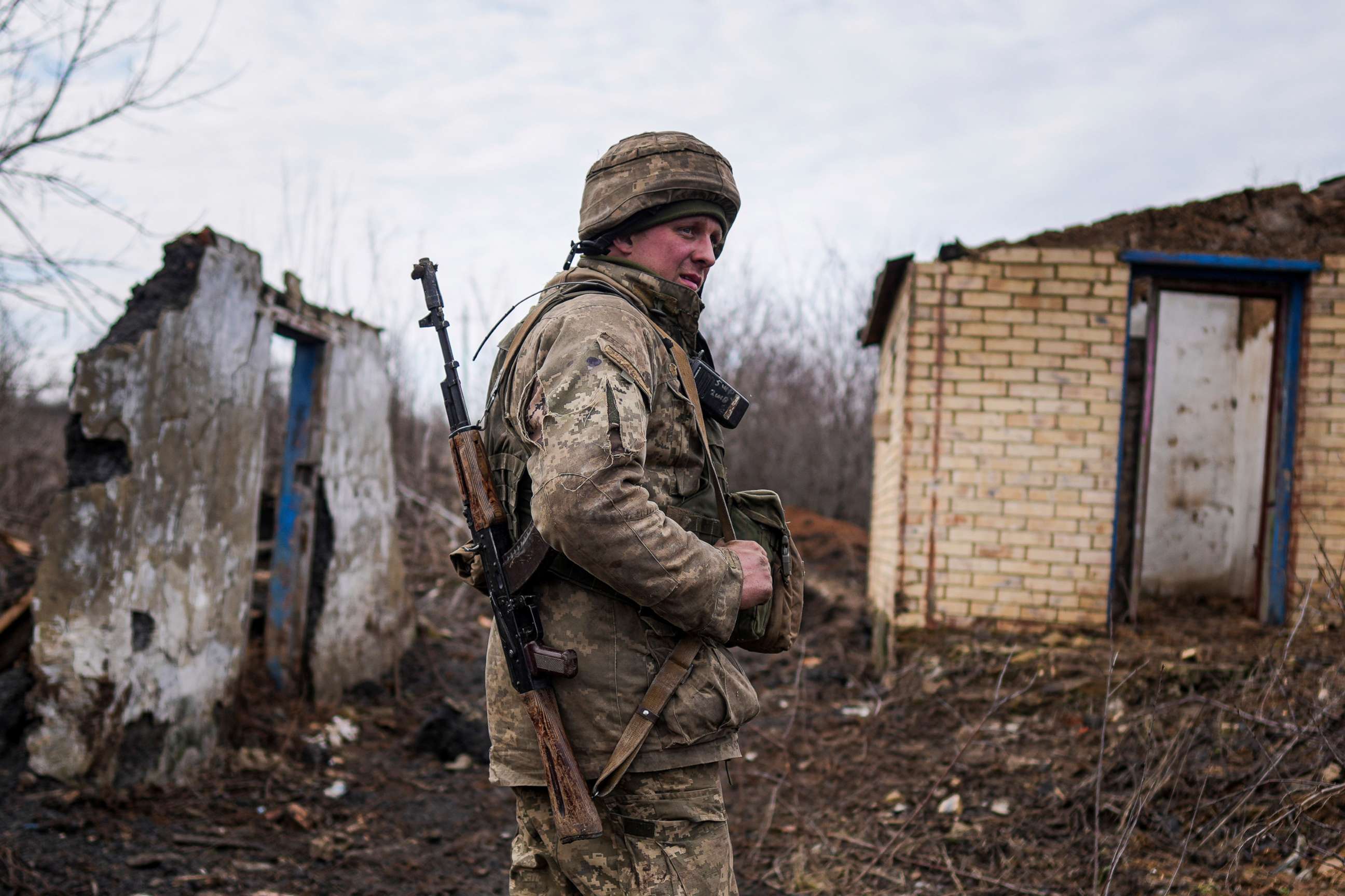 PHOTO: A Ukrainian serviceman stands at his position at the line of separation between Ukraine-held territory and rebel-held territory near Svitlodarsk, eastern Ukraine, Feb. 23, 2022.