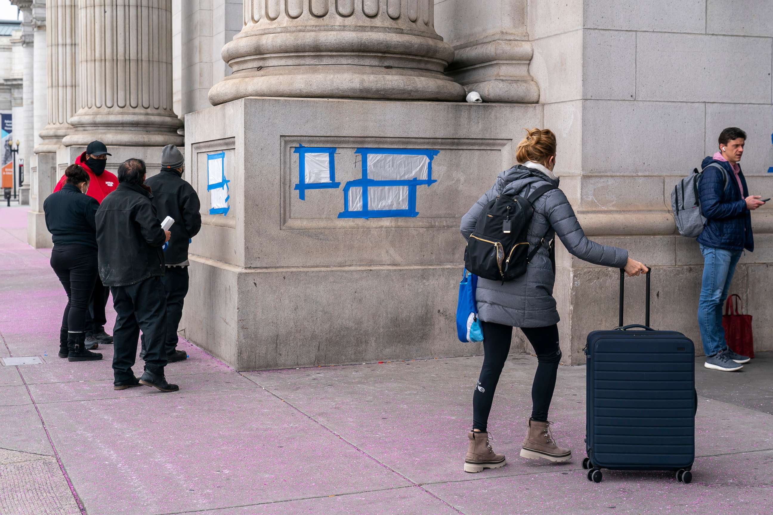 PHOTO: Blue tape and plastic covers swastikas that were graffitied on the front of Union Station near the Capitol, Jan. 28, 2022.