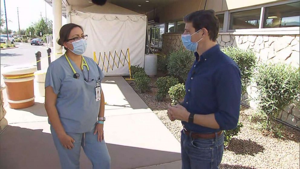 PHOTO: ABC News chief national correspondent Matt Gutman speaks to surgical nurse Vanessa Hidalgo about her experience treating COVID-19 patients. 