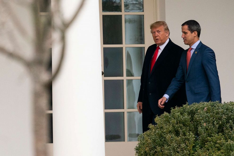 PHOTO: FILE - In this Feb. 5, 2020 file photo, U.S. President Donald Trump walks to a meeting in the Oval Office with Venezuelan opposition leader Juan Guaido at the White House in Washington.