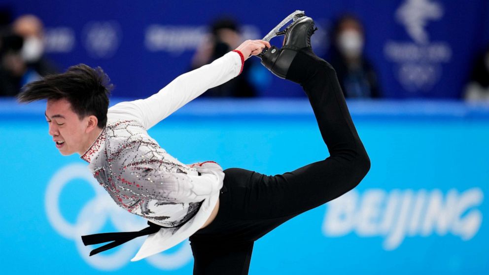 PHOTO: Vincent Zhou, of the United States, competes in the men's team free skate program during the figure skating competition at the 2022 Winter Olympics, Sunday, Feb. 6, 2022, in Beijing. (AP Photo/Natacha Pisarenko)