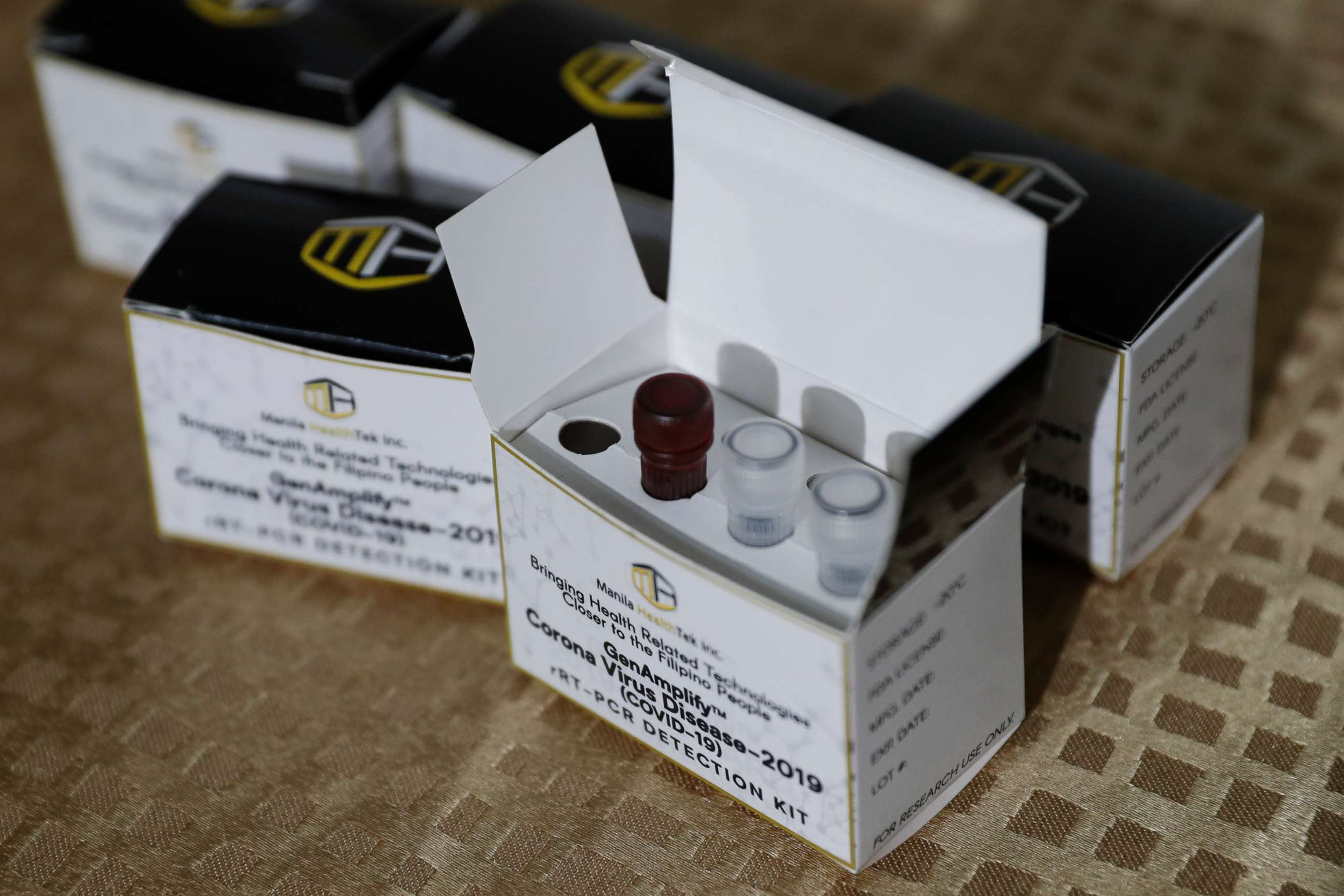 PHOTO: A newly developed SARS CoV-2 detection kit by University of the Philippines scientists is shown during a press conference in Quezon city, Philippines, Thursday, March 12, 2020. 