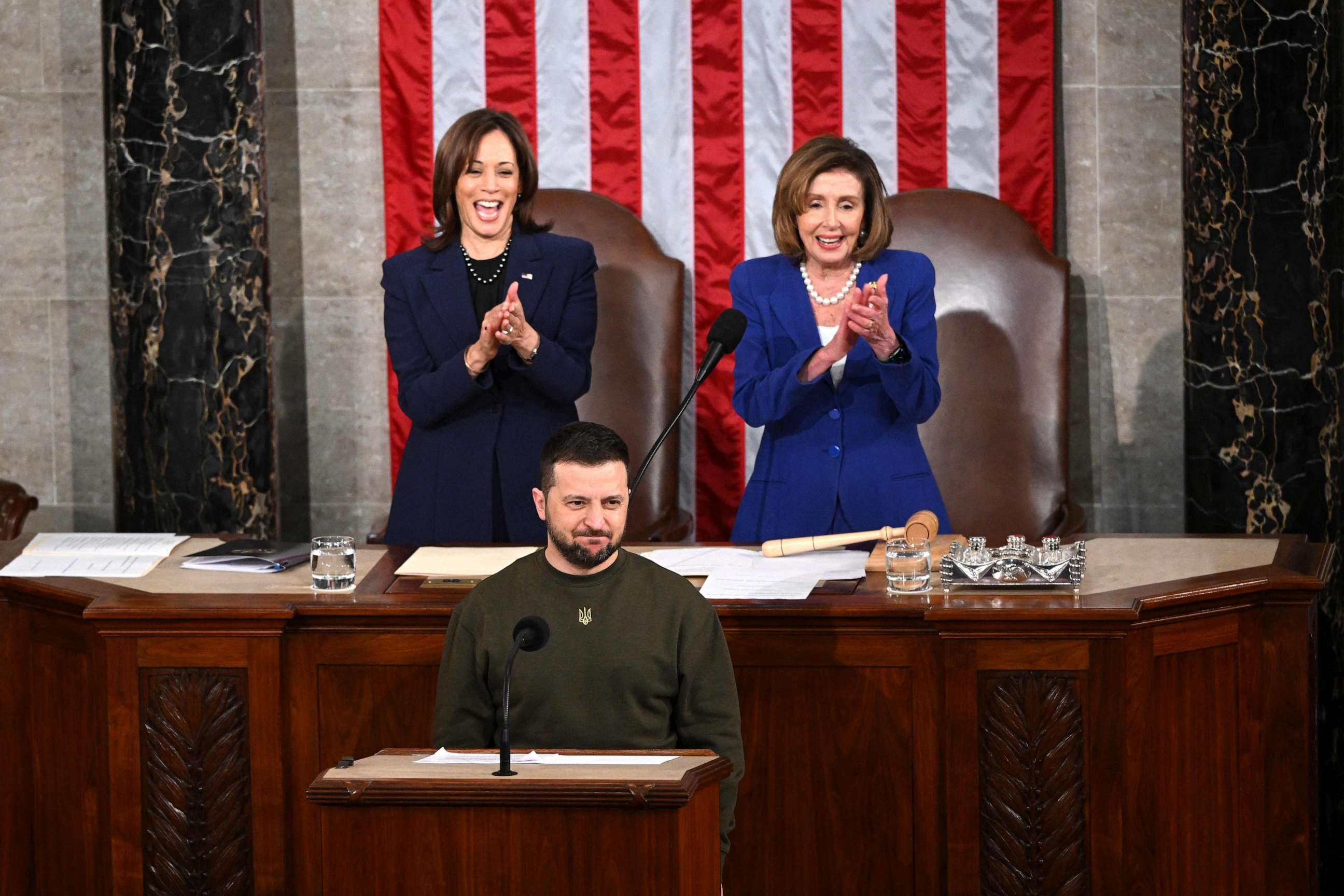 PHOTO: Vice President Kamala Harris and US House Speaker Nancy Pelosi applaud as Ukraine's President Volodymyr Zelensky addresses the US Congress at the US Capitol in Washington, Dec. 21, 2022.