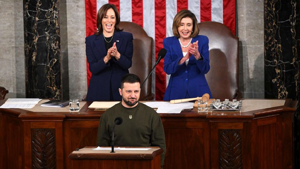 PHOTO: Vice President Kamala Harris and US House Speaker Nancy Pelosi applaud as Ukraine's President Volodymyr Zelensky addresses the US Congress at the US Capitol in Washington, Dec. 21, 2022.