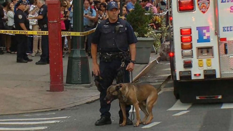PHOTO: Police gathered at the scene where a man was carrying a meat cleaver near Macy's in New York, Sept. 15, 2016.
