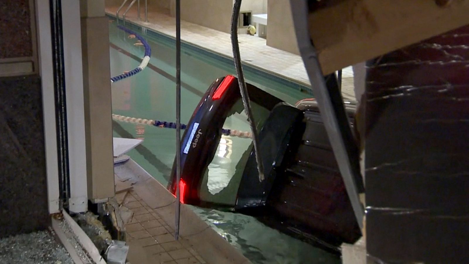 Car crashes into Seattle LA Fitness pool