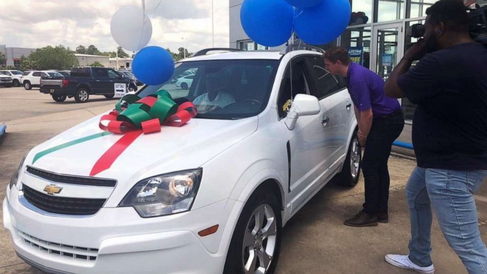 PHOTO:  Anita Singleton, a cashier at a Walmart in Slidell, La., sits in the Chevrolet Captiva she was presented with on May 22, 2019, after the community found out she often walks six miles to work.