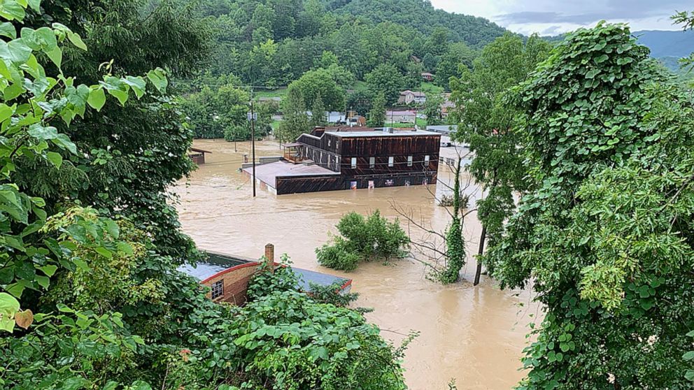  More rain in flooded areas, curfews imposed due to looting