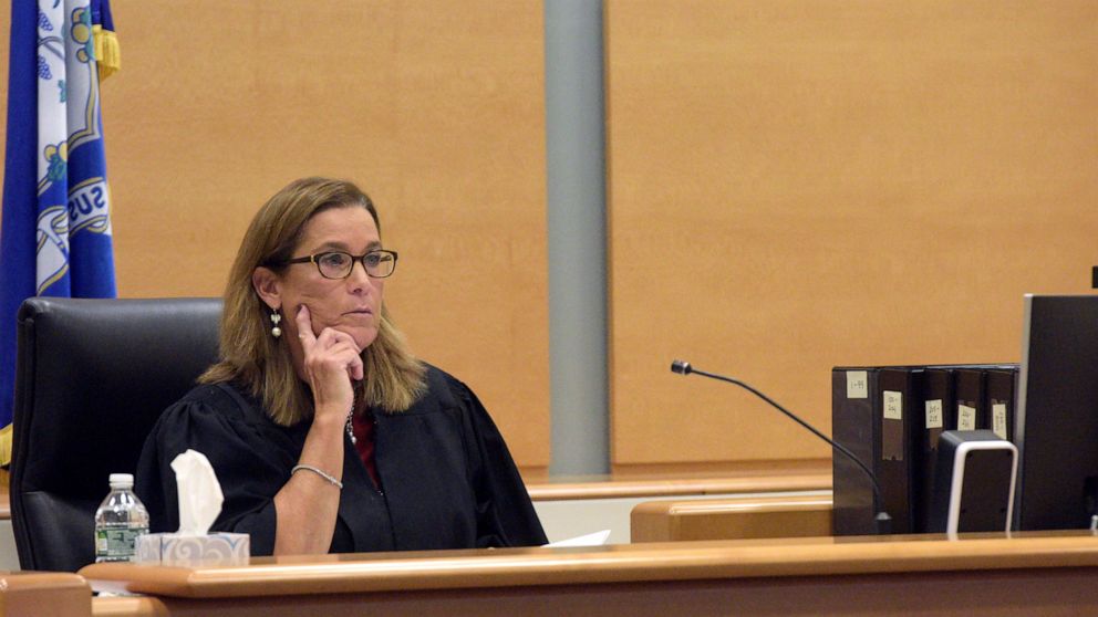 Superior Court Judge Barbara Bellis discusses a question from the jury with attorneys during deliberations in the Alex Jones Sandy Hook defamation damages trial in Superior Court in Waterbury, Conn., on Tuesday, Oct. 11, 2022. (H John Voorhees III/He