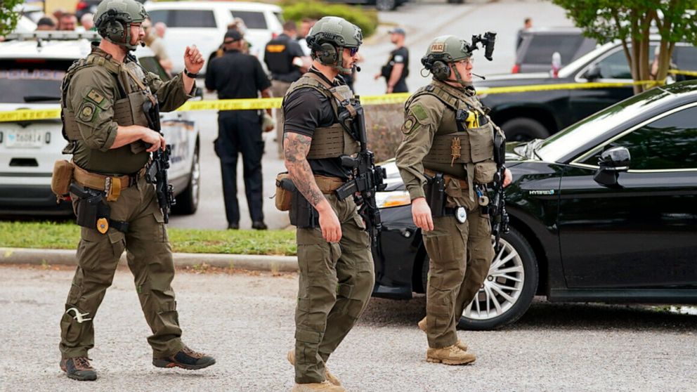 Authorities stage outside Columbiana Centre mall in Columbia, S.C., following a shooting, Saturday, April 16, 2022. (AP Photo/Sean Rayford)