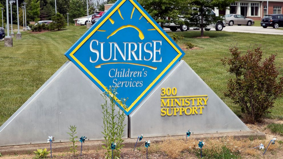 FILE - In this May 26, 2021 file photo, A sign for Sunrise Children's Services sits in front of the agency in Mount Washington, Ky. Kentucky reached a contract deal Thursday, July 15, 2021 to continue placing youngsters with a Baptist-affiliated chil