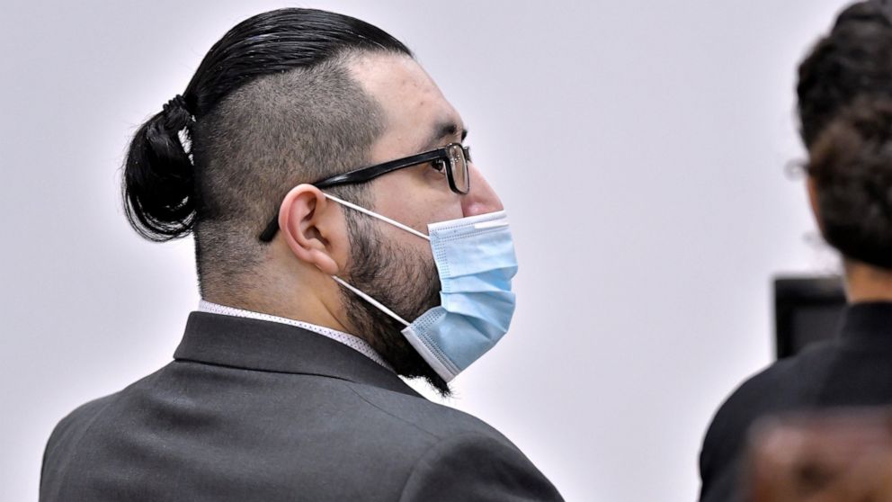 FILE - Armando Barron looks toward the jury during the first day of his trial at Cheshire County Superior Court, on May 17, 2022 in Keene, N.H. A jury on Thursday, May 26, 2022, convicted Barron of first-degree murder for killing his wife’s coworker 