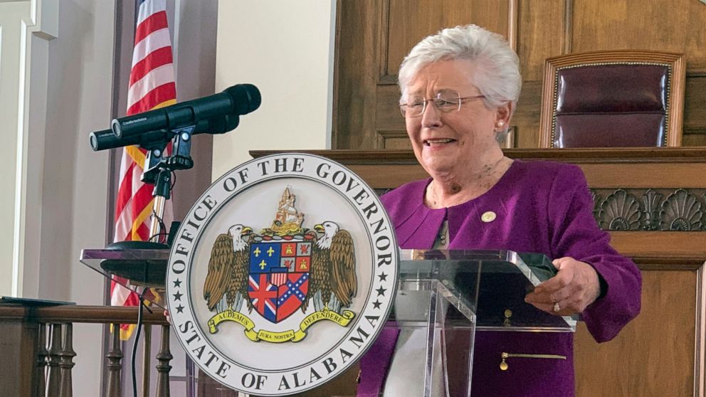 FILE - Alabama Gov Kay Ivey announces that a statewide mask order will be extended through Oct. 2, 2020 during a press conference at the Alabama Capitol in Montgomery, Ala., on Thursday, Aug. 27, 2020. Alabama won't require background checks for conc