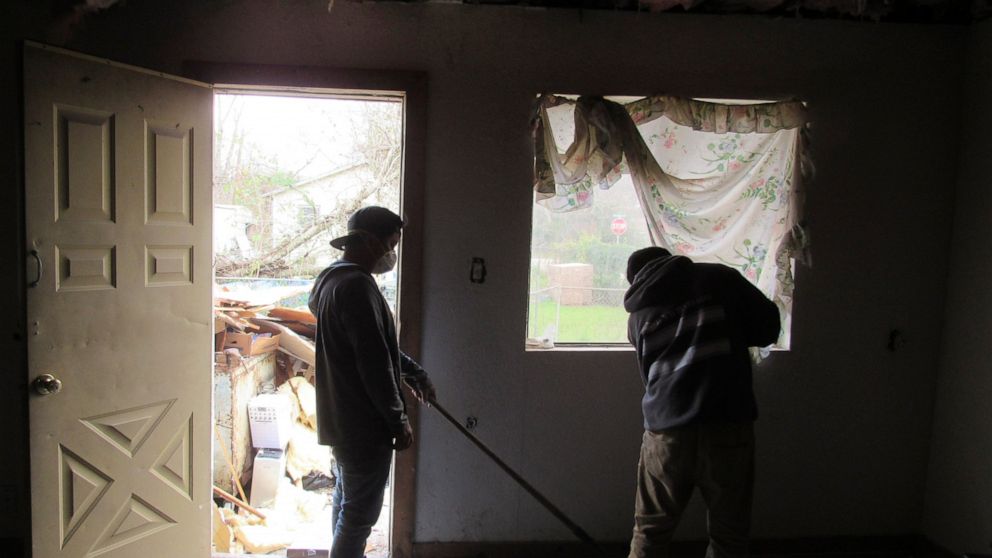 Construction workers continue Friday, January 31, 2020, repairing and cleaning up the Hurricane Harvey damaged home of Houston resident Lawrence Hester. Hester said he was unable to get help from a city program created to fix homes damaged during Har